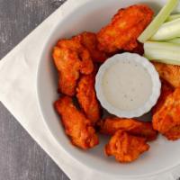 Hot Wings · Choose from chef's buffalo sauce, gochujang sauce, or get them with our famous'Tennessee Hot...