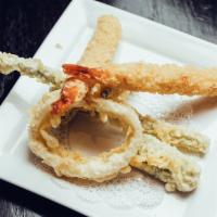 Shrimp Tempura · Large jumbo shrimp and assorted fresh vegetables lightly fried in tempura crumb batter.