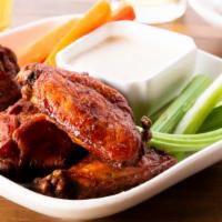 Smoked Chicken Wings · Gluten-free. Alabama White Sauce, BBQ Dry Rub, Crudité.