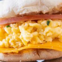 Egg Sandwich · 2 scrambled eggs with American cheese and add bacon, sausage or ham for an extra charge.