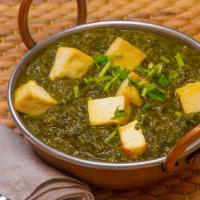 Palak Paneer · Homemade cottage cheese cooked with chopped spinach, onions, tomatoes, and a variety of herb...