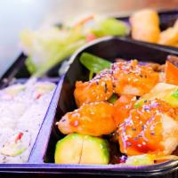 Teriyaki Shrimp Bento Box · Served with soup, green salad, Crab Rangoon, a six-piece California roll and boiled rice.