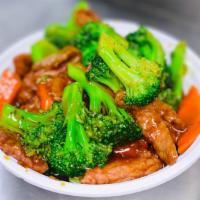 Beef With Broccoli · Served with boiled rice.