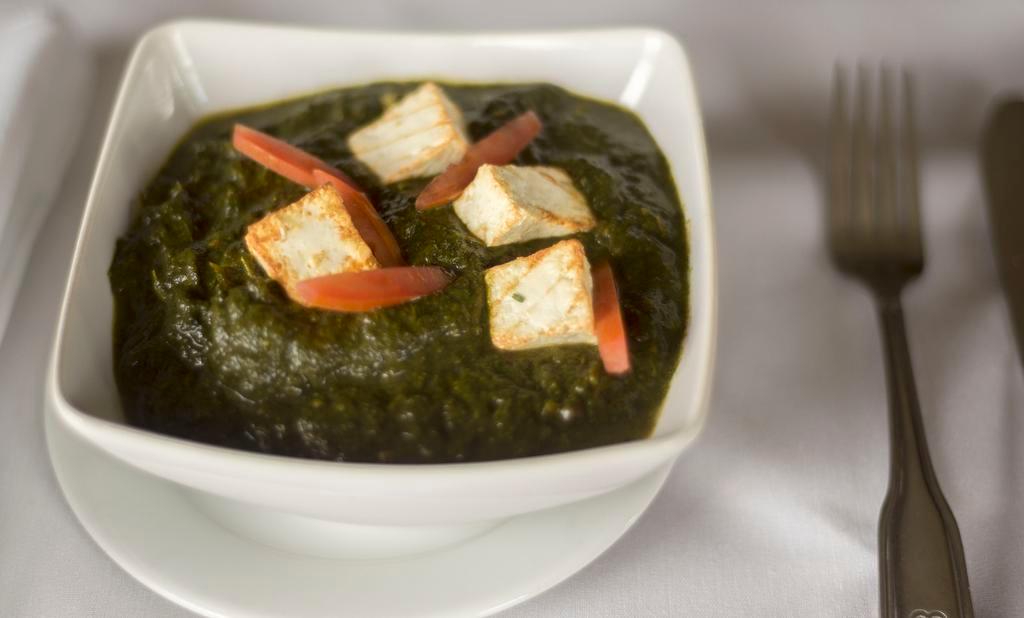 Palak Paneer · Homemade cheese cubes in spinach. (gluten free)