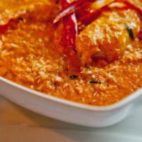 Fish Curry · Tilapia cooked in traditional curry sauce. (gluten free)