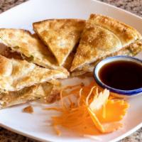 Scallion Pancakes · Vegetarian scallion homemade style fried. Served with house ginger sauce.