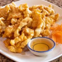Thai Tempura (Vegetable Or Chicken) · Choice of vegetable or chicken deep-fried in a crispy batter. Served with sweet and sour sau...