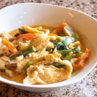 Panang Curry · Less spicy. Panang curry and coconut milk with string beans, baby corn, red-green peppers, m...