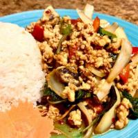 Chicken Gaprow · Thai style spicy minced chicken in chili garlic sauce with red-green peppers, onions, mushro...