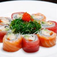 Season Maki · Spicy lobster with avocado and cucumber topped with salmon, tuna, and garnish with seaweed s...