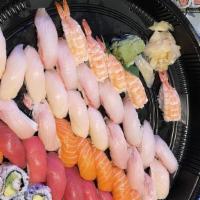 Sushi Boat 2 · 40 pieces nigiri, six pieces California roll, six pieces spicy tuna roll, and five pieces sp...