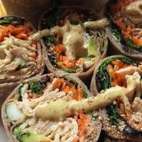 Soy Wrap · Choice of soy chicken or soy beef, wasabi hummus, cucumber, avocado, carrot, sesame.