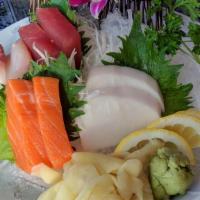 Sashimi Sampler · 8 pieces of assorted fish