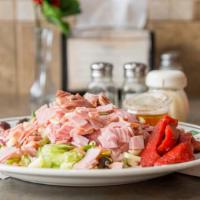 Chef Salad · Ham, turkey and provolone over a house salad.