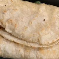 Quesadillas · Two handmade stuffed tortillas, melted Mexican cheese, and fresh epazote. Add beans, chicken...