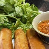 Thai Rolls (4) · Crispy spring rolls stuffed with mixed vegetables, served with sweet & sour sauce.