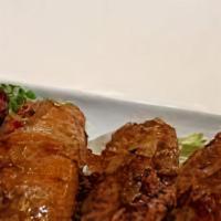 Thai Wings (6) · Chicken wings marinated in zesty herbs, deep fried to a deep golden brown and served with sw...