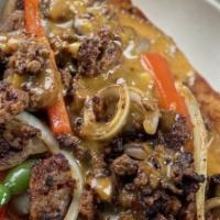 Philly Cheese Steak (With Chips & A Drink) · Impossible meat with sauteed onions, peppers, mushrooms, topped with chef's special sauce on...