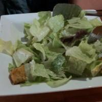 Caesar Salad · Crisp romaine lettuce, anchovies, parmesan cheese and homemade croutons.