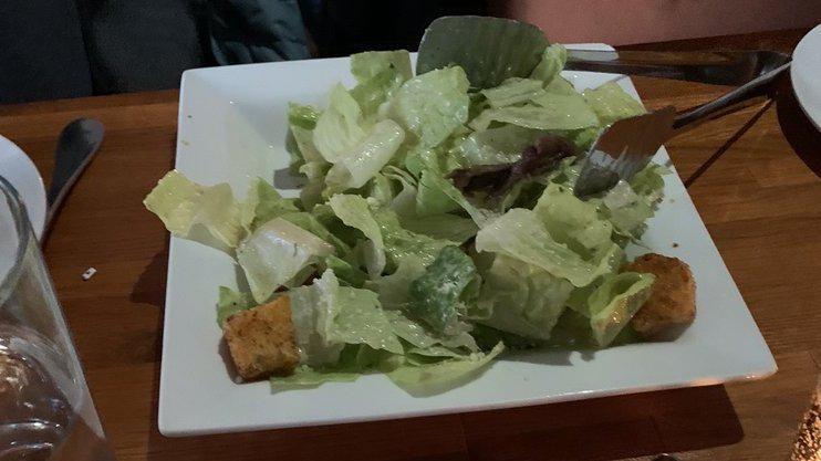 Caesar Salad · Crisp romaine lettuce, anchovies, parmesan cheese and homemade croutons.