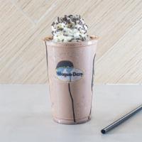 Belgian Chocolate Shake · Belgian chocolate ice cream surrounded by ribbons of hot fudge topped with whipped cream and...