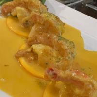 Shrimp Grand Marnier · Four egg battered shrimp, flamed with Grand Marnier liqueur & orange juice.