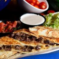 Steak Quesadillas · Flour tortilla, quesillo, Mexican crema, pico de gallo