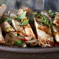 Chicken Fajitas · Mixed bell peppers, onion, topped with cilantro. Served with Mexican crema, pico de gallo, q...