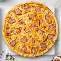 Tropical Hawaii Pizza · Ham and pineapple baked on a hand-tossed dough.