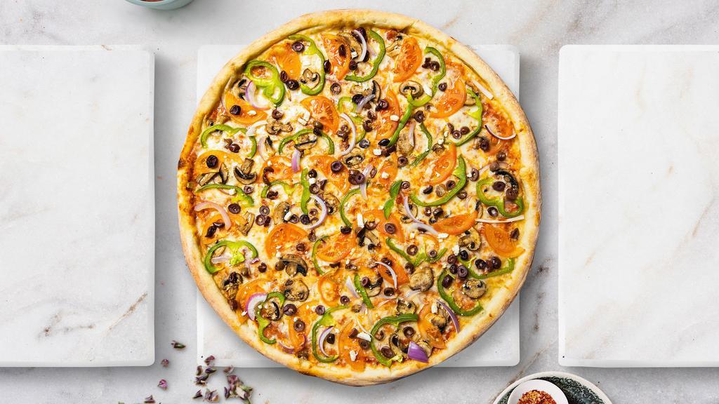 Veggie Feast Pizza · Mushrooms, eggplant, black olives, green peppers, tomatoes, and broccoli baked on a hand-tossed dough.