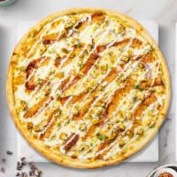 Loaded Ranch Pizza · Ranch drizzle, juicy chicken, crispy bacon, mozzarella, marinara, chopped garlic, and fresh ...