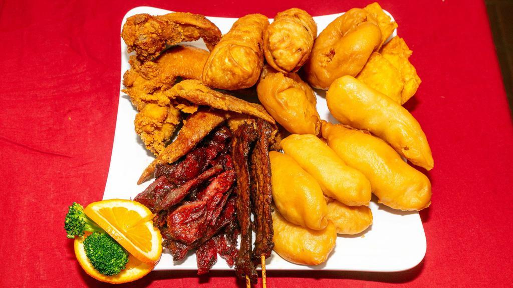 Pu Pu Platter · Favorite. Four pieces of crab rangoons, boneless spare ribs, two pieces of egg rolls, two pieces of fried shrimp, two pieces of teriyaki beef, six pieces of chicken fingers and four pieces of chicken wings.