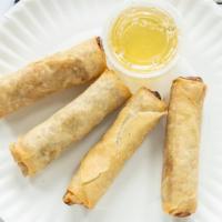 Crispy Spring Rolls · Crispy rolls stuffed with minced chicken breast, cabbage, carrot . served with a sweet & sou...