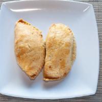 Meat Pie (1 Pc) · Flaky pastry filled with seasoned ground beef.