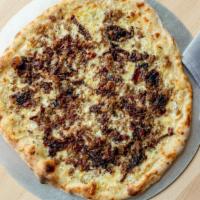 18″ Large Alsatian Pie Pizza · Gruyere cheese, fromage blanc, caramelized onion, Italian sausage and bacon, thyme. BEST SEL...