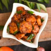 Shrimp Palak · Masala shrimp cooked with fresh spinach, spices and ginger.