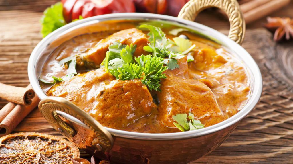 Tilapia Fish Curry · Perfectly prepared Tilapia fish cooked with tomatoes, onion, and herbs.