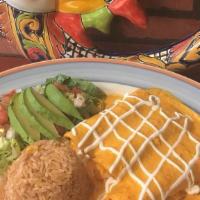 Enchilada · Soft folded corn tortillas stuffed with your choice of cheese, shredded chicken or beef, top...