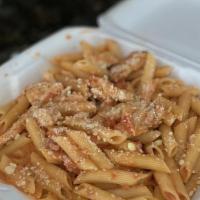 Penne Vodka · Penne in a pink vodka sauce with prosciutto, garlic, and spices.
