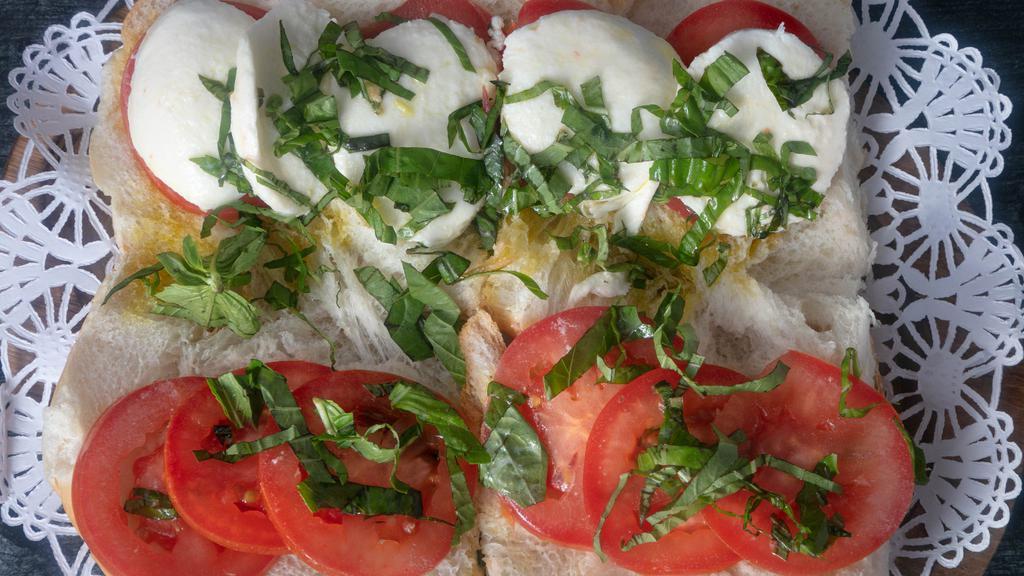 Caprese Sub (Large) · Fresh mozzarella, basil and roma tomatoes and extra virgin olive oil.