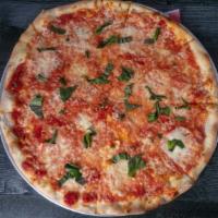 Margherita Pizza · Fresh basil, crushed plum tomatoes, Romano, fresh mozzarella, olive oil and a touch of garlic.