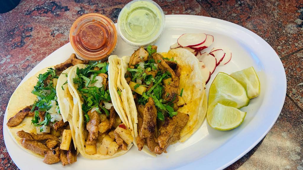 Tacos (3) · Soft tacos served with cilantro, dried onions, and sauce on the side. Beef, chicken, chorizo, marinated pork, pork, or veggies. Fish or shrimp at an additional price.