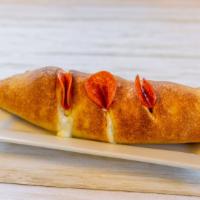 Pepperoni Roll · Pepperoni sauce & extra cheese rolled in a blanket.