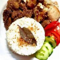Chicken And Pork Adobo · Chicken and Pork Adobo is a combination of marinated chicken and pork in soy and vinegar ser...