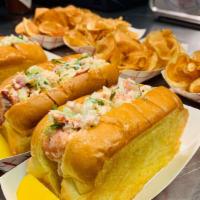 New England Lobster Roll · Our take on the new england lobster roll, a mayonnaise base with celery, pickled red pepper ...