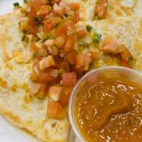 Lobster Quesadilla · Our three cheese blend on a flour tortilla stuffed with chilled lobster and topped with sour...