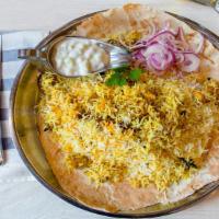 Chicken Biryani · Our popular biryani is made authentically with fresh chicken and fried onions cooked with ou...