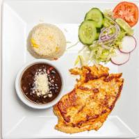 Pollo Asado · Grill chicken breast. Rice, black beans, salad and tortillas.