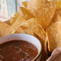 House-Made Chips & Salsa · house-made corn tortilla chips with roasted salsa rojo. gluten free + vegan.