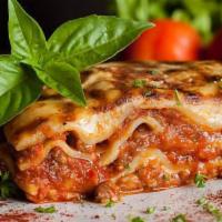 Beef Lasagna · Layered pasta baked with ground beef, marinara sauce, and Parmesan cheese.